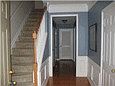 First floor has wainscotting & hardwoods throughout foyer