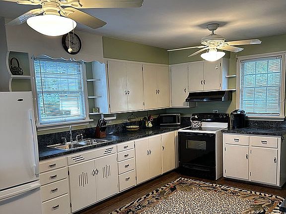 Kitchen w/ river & pool view