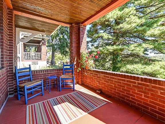 Private, calm, and slightly removed from the street activity while still enjoying the charm of the neighborhood.