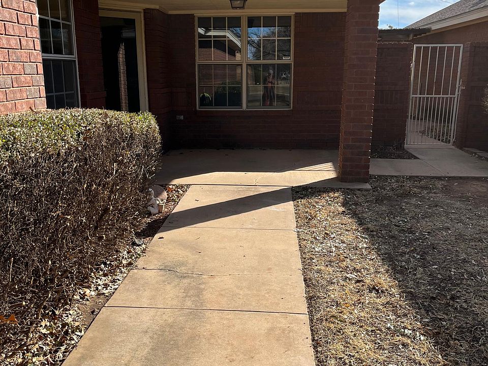 Front entry with covered front porch large enough for comfortable patio chairs.
