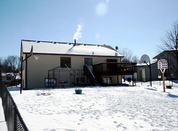 Roomy, long back yard with newer fencing for pets and small children.