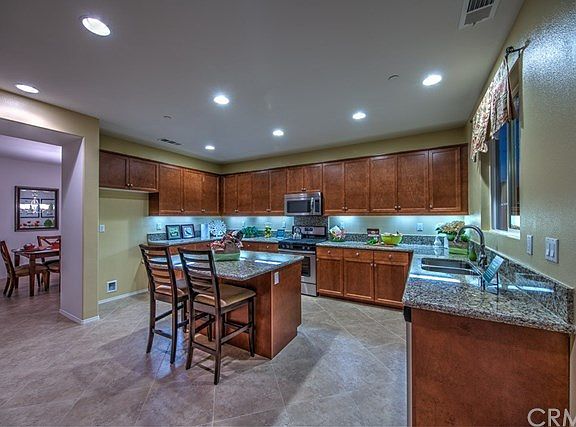 Photo of model home kitchen, photo not intended to depict actual home