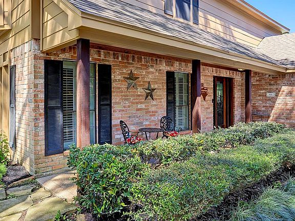 Side porch with seating area.