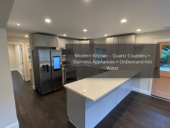 Your dream kitchen features quartz counters, custom cabinetry, and stainless-steel Samsung appliances _ elegant, efficient, and built to inspire creativity.