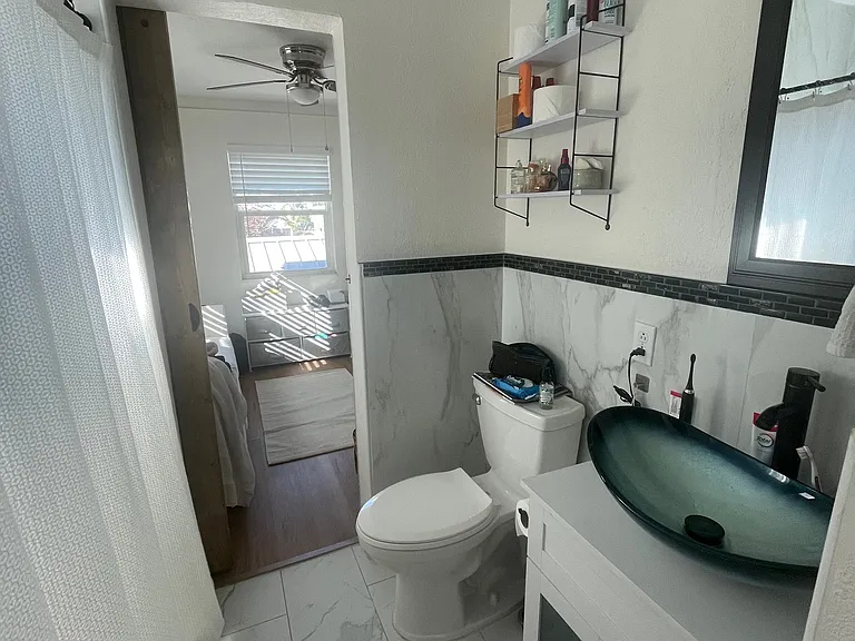 Bathroom looking into BR 2
