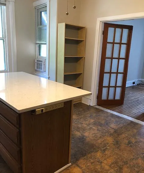 New Quartz countertop Island showing floor