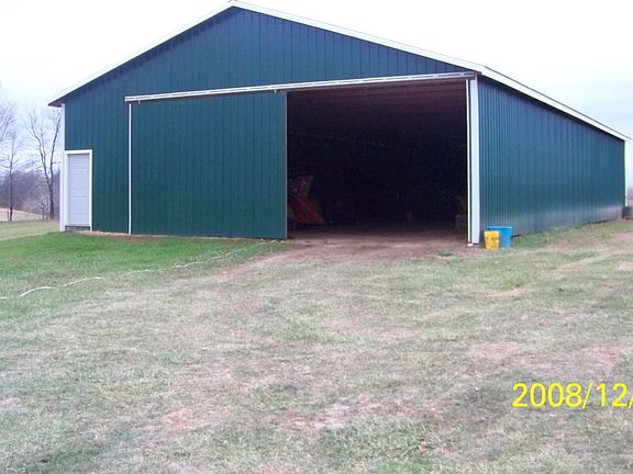 40x80 barn in back
