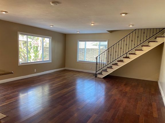 Livingroom with staircase to 2nd floor.
2nd Floor has on Large Bedroom (2nd master), one bath and One additional Bedroom