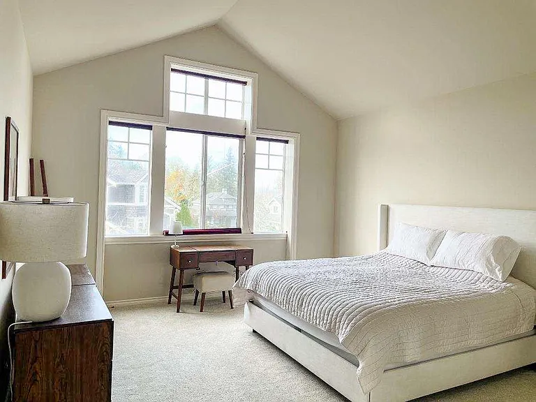X-Large Master Bedroom with vaulted ceilings. Opens into adjacent seating nook, master bath and walk in closet. A private sanctuary within the home.