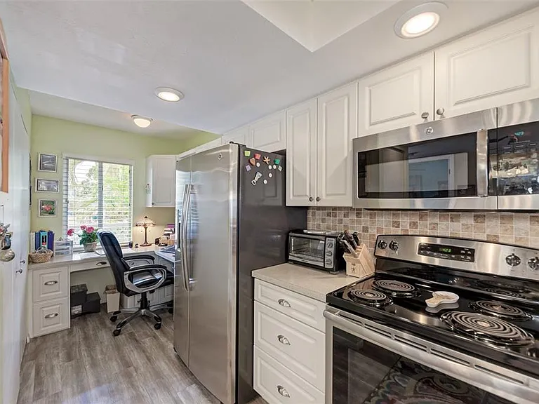 The ultimate home office. __ Who says you can't mix business with pleasure? Our dedicated office area is flooded with natural light, creating a bright and energizing space to stay productive between trips to the pool or the beach.