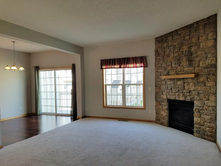 Gas fireplace and mantel in living room