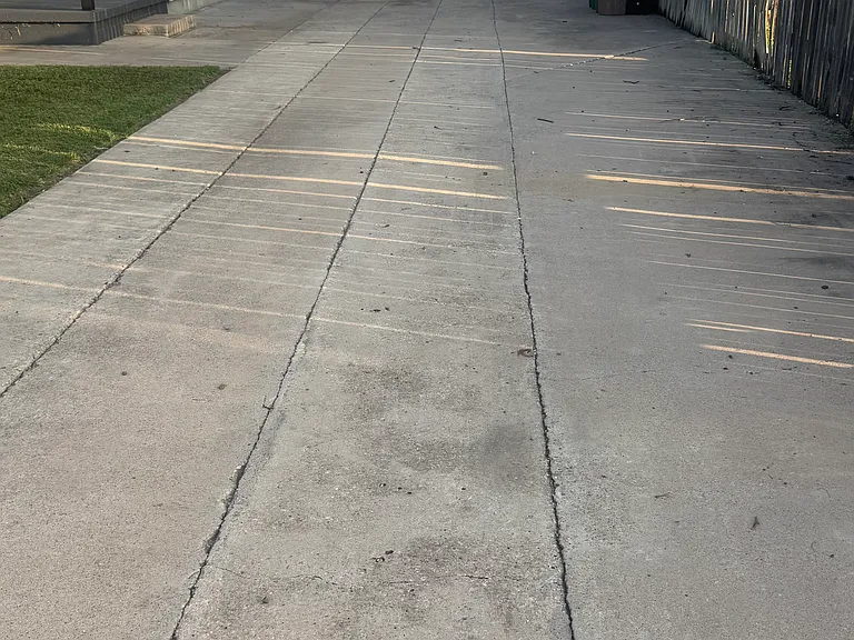 Long driveway can fit multiple cars. 
Also a one car garage