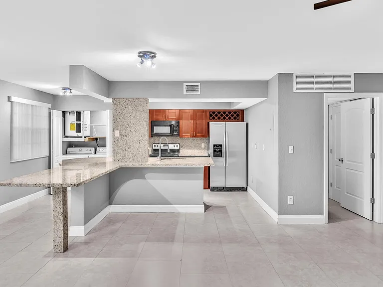 2881 N Oakland Forest Dr #105 — Photo 6
