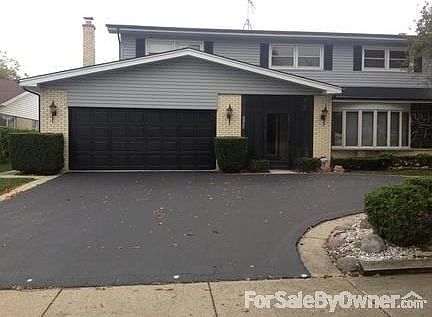 Front view
						:
						Great circular drive provides up to 6 parking spots on property