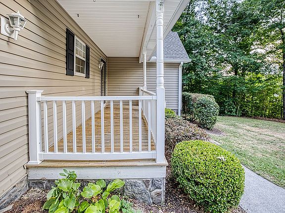 Front Porch w/ swing hooks.