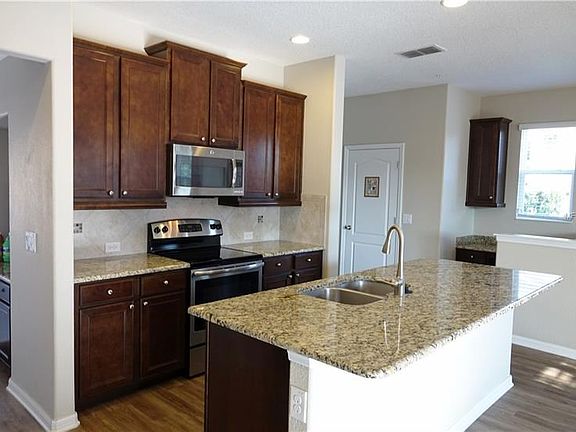 Kitchen with breakfast Bar - Left - Drop Zone - Right Work from Home Desk Area