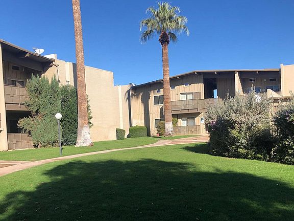 Mid-century (1962) structures in mature landscaping