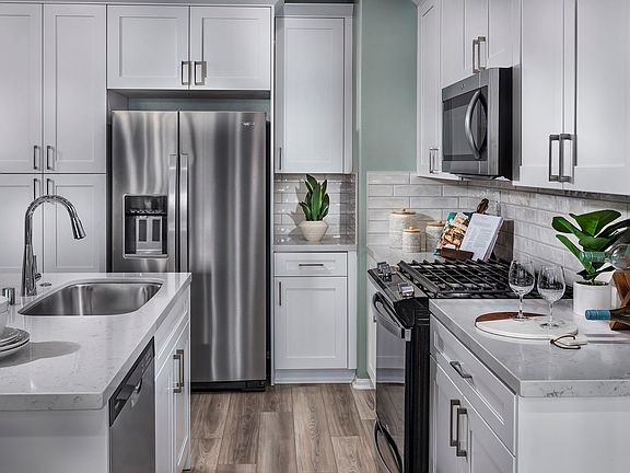 Residence 3 interior image modeled at a nearby Meritage community.