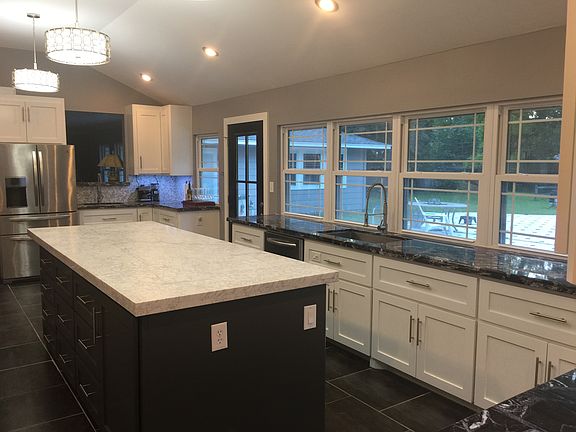 Window wall overlooks pool