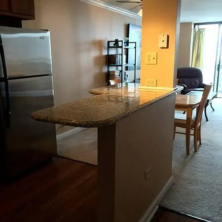 breakfast bar opens into Living Room