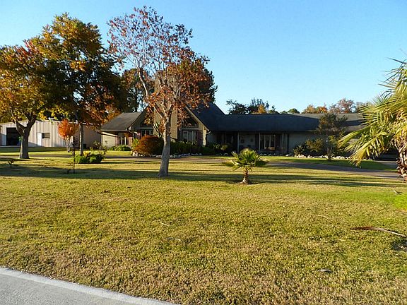 This house is across the street from the acre of land