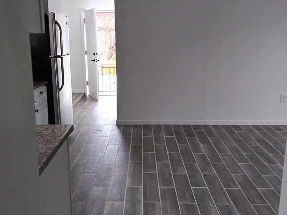 5th image of 935 E 216th St APT 1