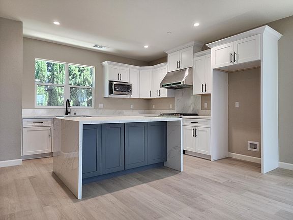 Kitchen with Waterfall Island