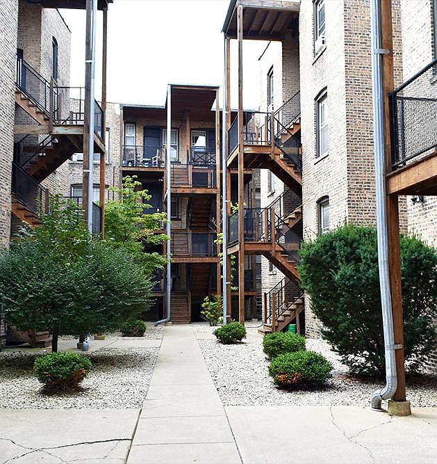 Enjoy the stunning Zen Serenity Gardens Courtyard with peaceful-inspired landscaping. Here's where you want to relax and read for hours.