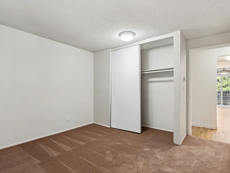 Step into comfort in this stylish bedroom with ample storage and natural light. Step into comfort in this stylish bedroom with ample storage and natural light.