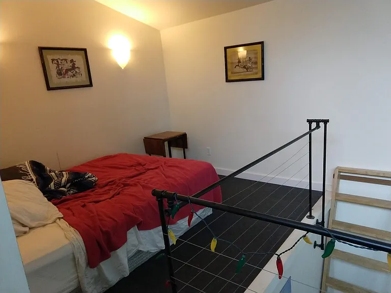 Loft space can be used as guest bedroom, office, or library!