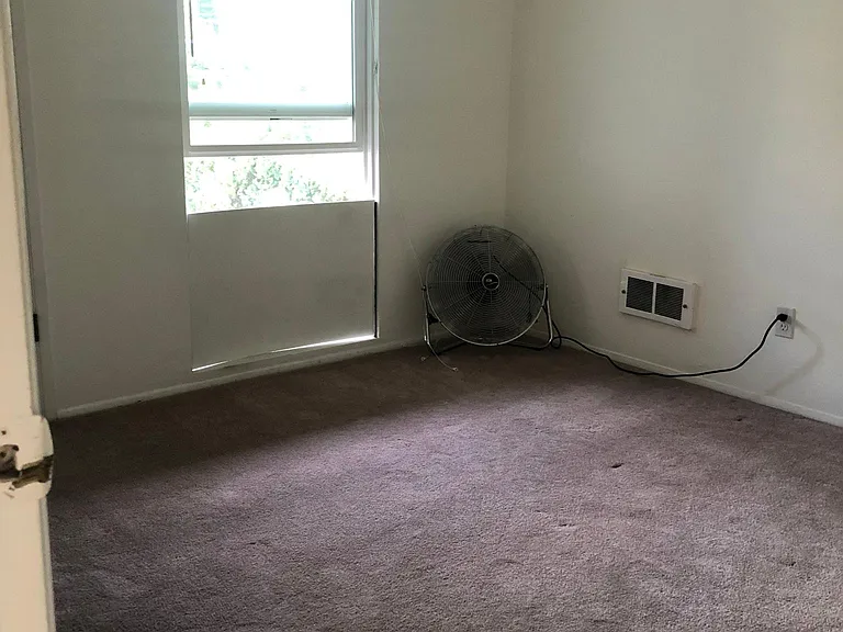 2nd bedroom (view parking lot) with 2 closets.