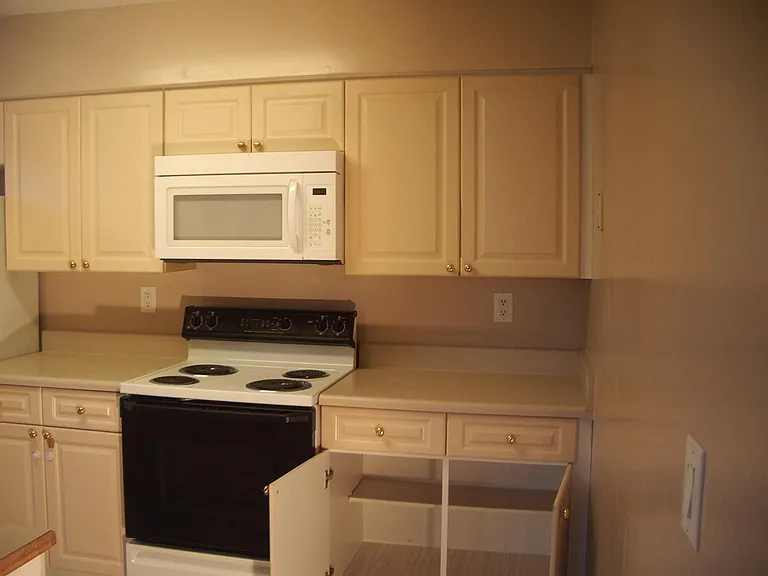 Kitchen - stove, microwave, refrigerator with icemaker and garbage disposal