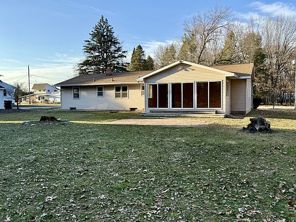 Back of House with View of 3 Season Porch