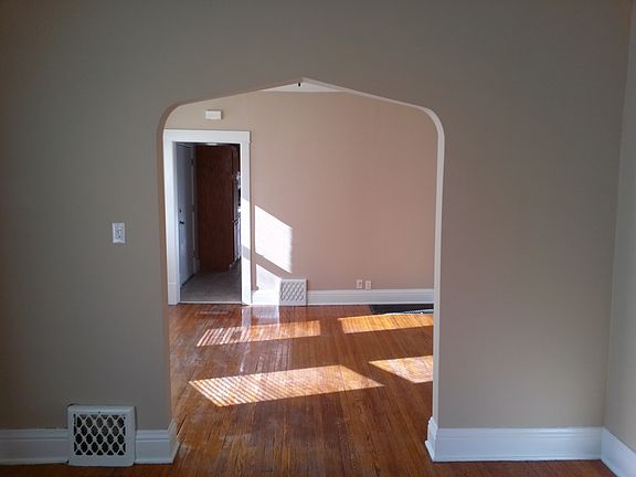 View of the family room and kitchen from front of the house