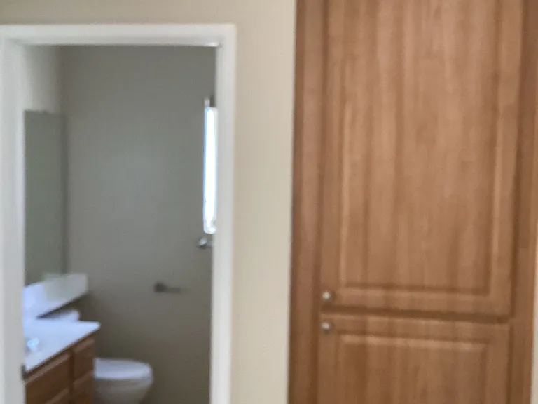 Upstairs hall full bath and linen closet.