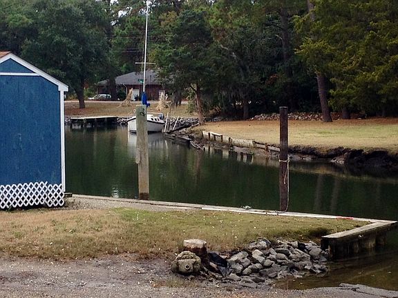 Canal and boat ramp in front
