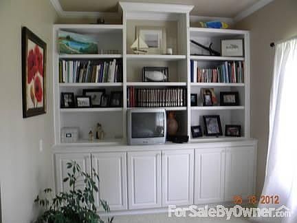 Office
						:
						Custom built-ins provide great storage.