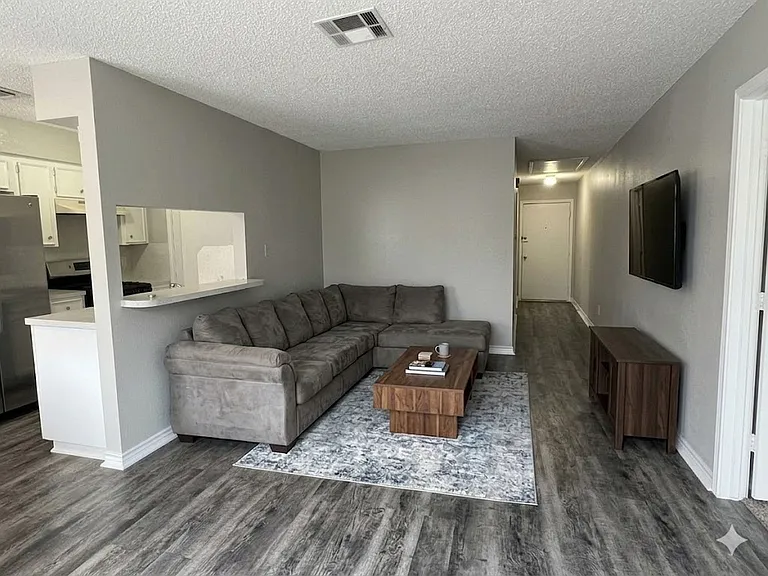 Main living area. Virtually staged