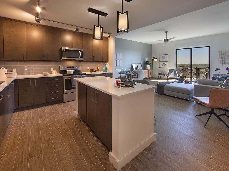 The Residences at THesis Model Kitchen and Living