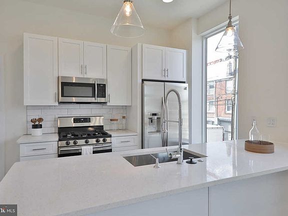 3rd image of 1125 N American St #6