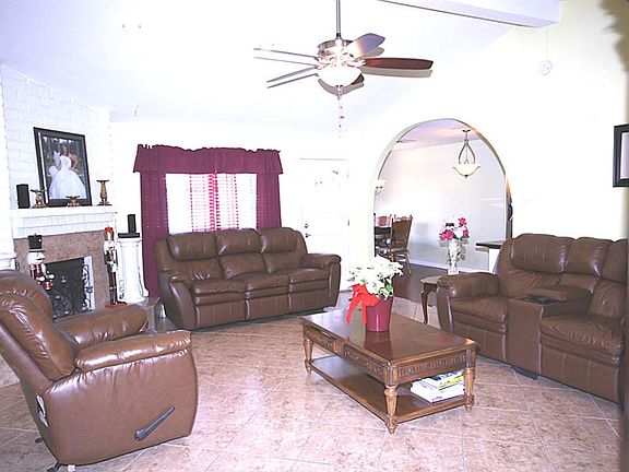 The family room also has a vaulted ceiling and opens to the kitchen and breakfast rooms.