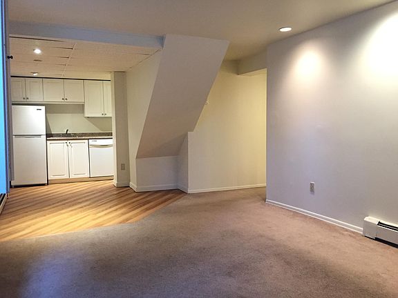 Photo taken from corner on living room. Bedrooms and bath are off the hall to the right.