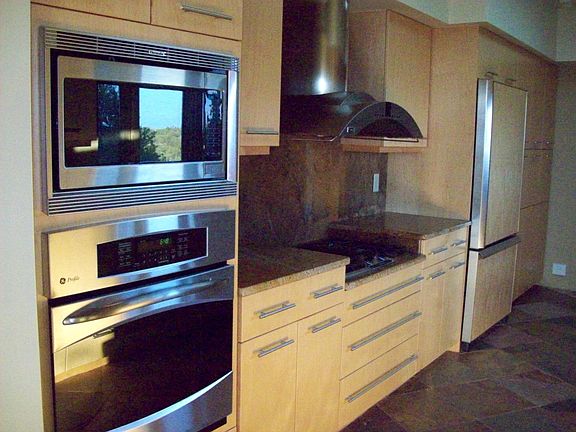 Kitchen, gas stove, washer/dryer inside under cabinets