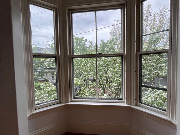 Living room window in front of unit