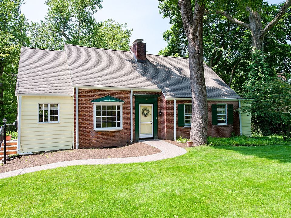 Front View - Brick and Wood Shingle