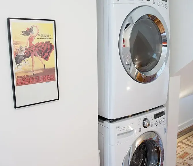 Washer dryer in unit.
