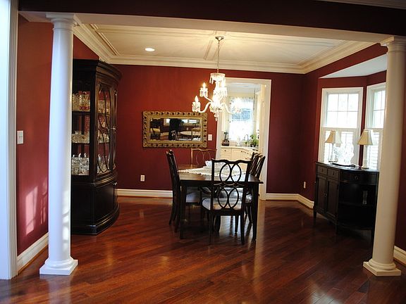 Very roomy dining room. Stunning cherry hardwood floors.