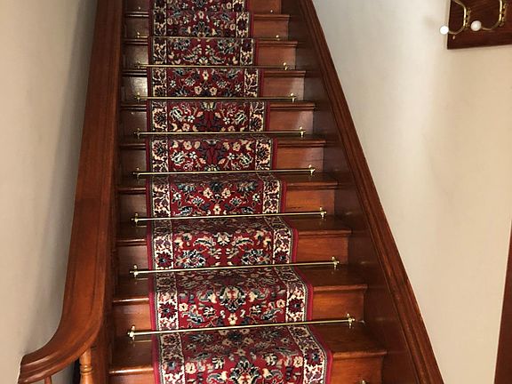 Beautiful wooden stairway into apartment