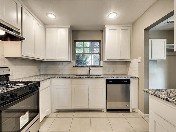 Complete kitchen makeover!  Cabinets, countertops and appliances all replaced in June 2018