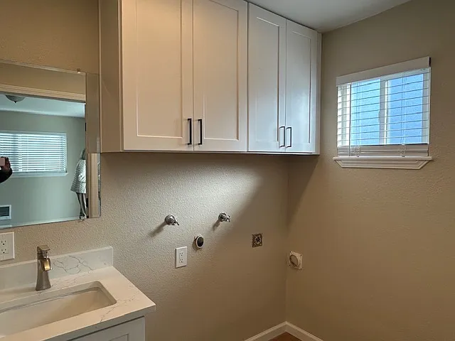 Laundry hookups and plenty of cabinets